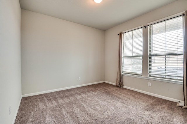 spare room with carpet flooring