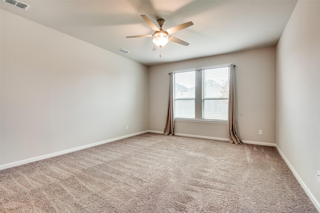 empty room with light carpet and ceiling fan