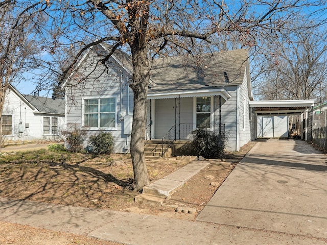 bungalow-style house with a carport