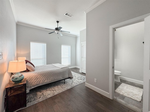 bedroom with ornamental molding, dark hardwood / wood-style flooring, connected bathroom, and ceiling fan