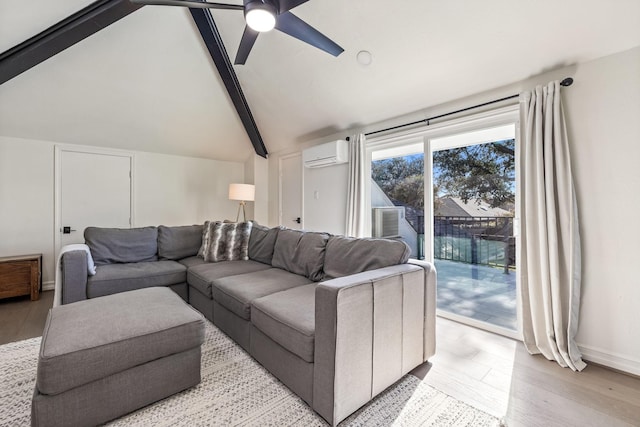 living room with baseboards, light wood-style flooring, ceiling fan, a wall mounted air conditioner, and vaulted ceiling with beams