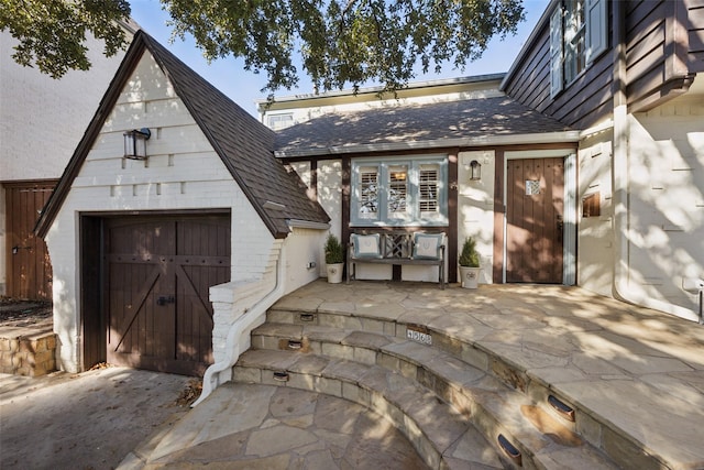 entrance to property featuring a garage