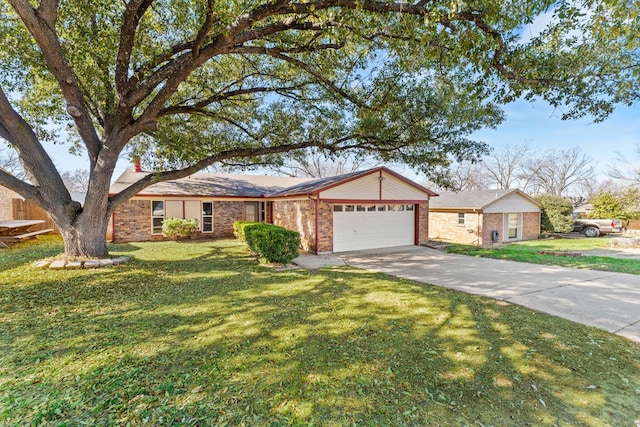 single story home featuring a garage and a front lawn