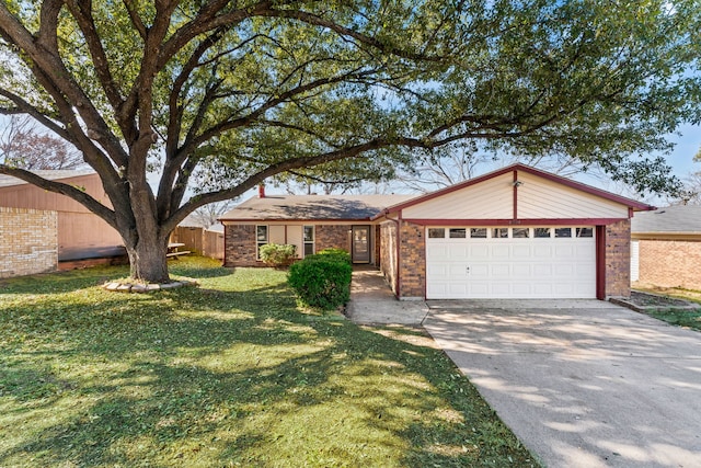 ranch-style house with a garage and a front yard