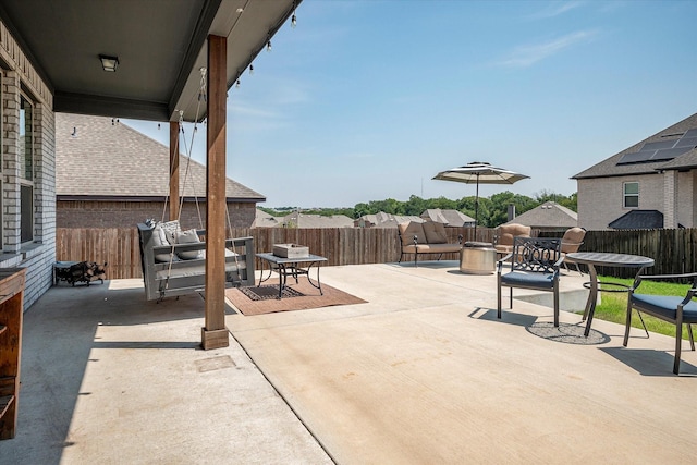 view of patio / terrace featuring a fenced backyard and outdoor dining space