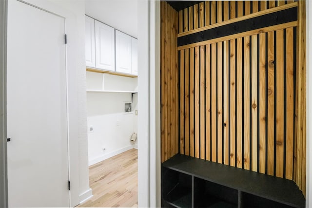 mudroom with light hardwood / wood-style floors