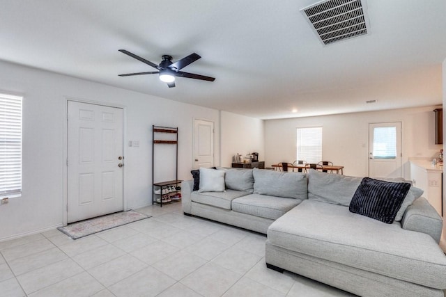 living room with ceiling fan