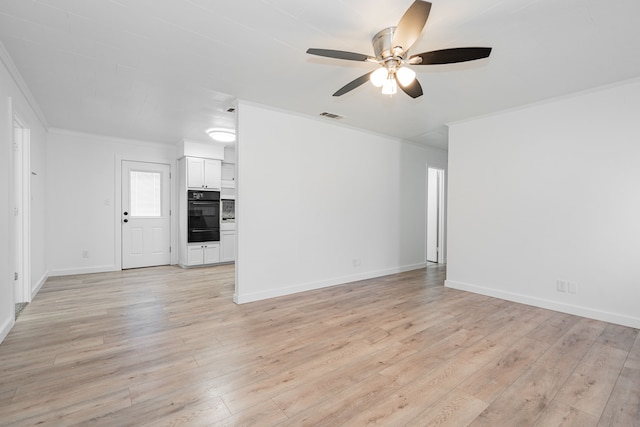 unfurnished living room featuring crown molding, ceiling fan, and light hardwood / wood-style floors