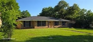 ranch-style house with a front yard