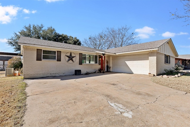 ranch-style house featuring a garage