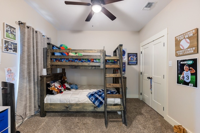 bedroom featuring ceiling fan, carpet flooring, and a closet