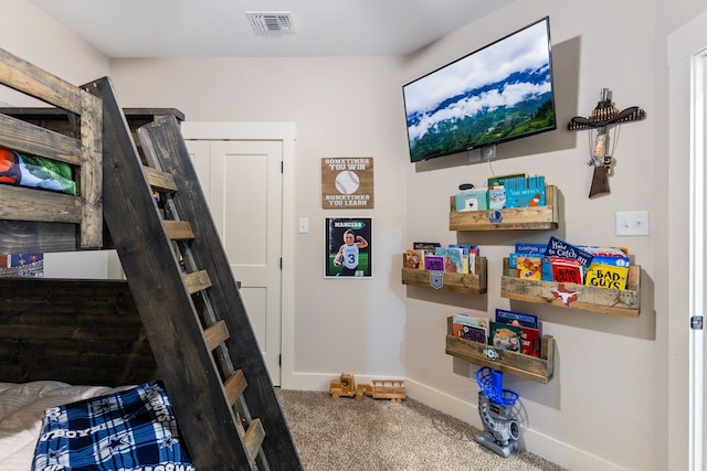 bedroom featuring carpet