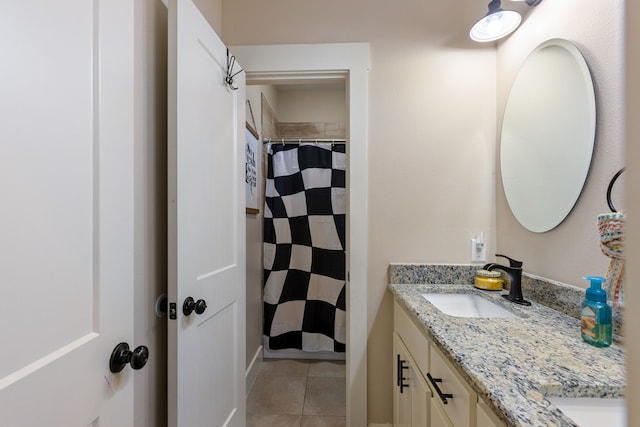 bathroom with vanity, tile patterned floors, and a shower with curtain