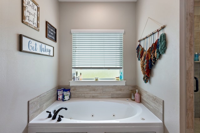 bathroom featuring shower with separate bathtub