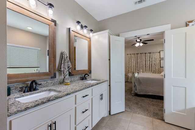 bathroom with vanity, tile patterned floors, and ceiling fan