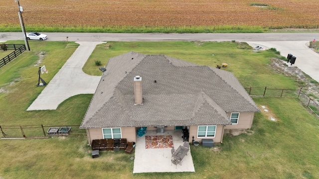 birds eye view of property featuring a rural view