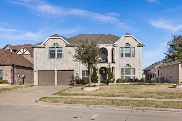 french country home with cooling unit, a garage, and a front yard