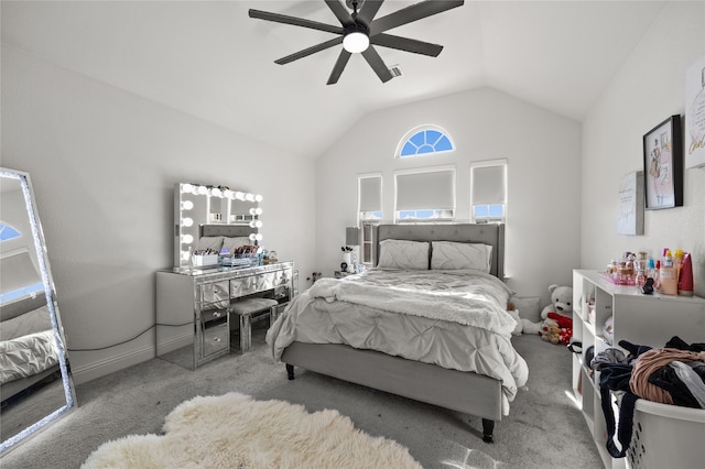 bedroom featuring lofted ceiling, carpet floors, and ceiling fan