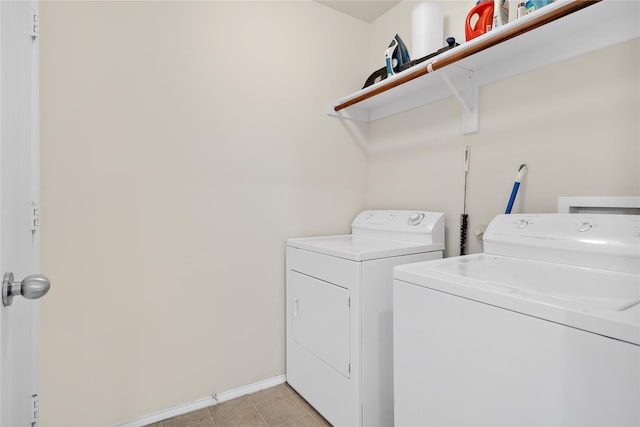 washroom with independent washer and dryer