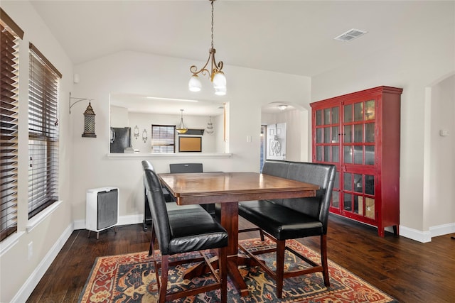 dining area featuring dark hardwood / wood-style flooring and a wealth of natural light