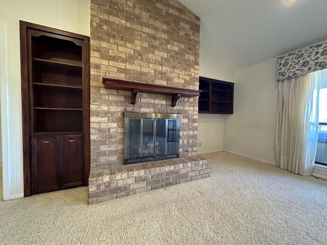 unfurnished living room with a fireplace, vaulted ceiling, and light colored carpet