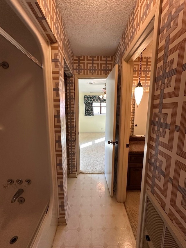 bathroom featuring a textured ceiling