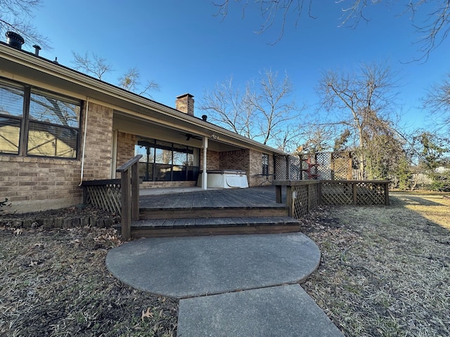 doorway to property with a deck