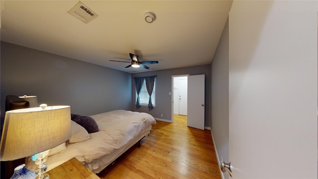 bedroom featuring light hardwood / wood-style flooring and ceiling fan