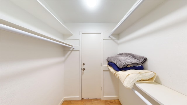 walk in closet featuring light wood-type flooring