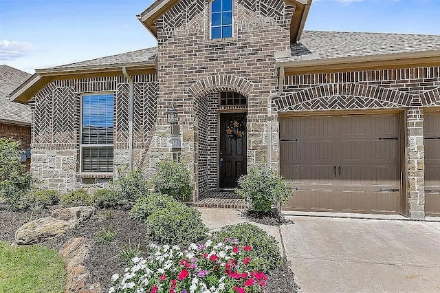 view of front of house with a garage