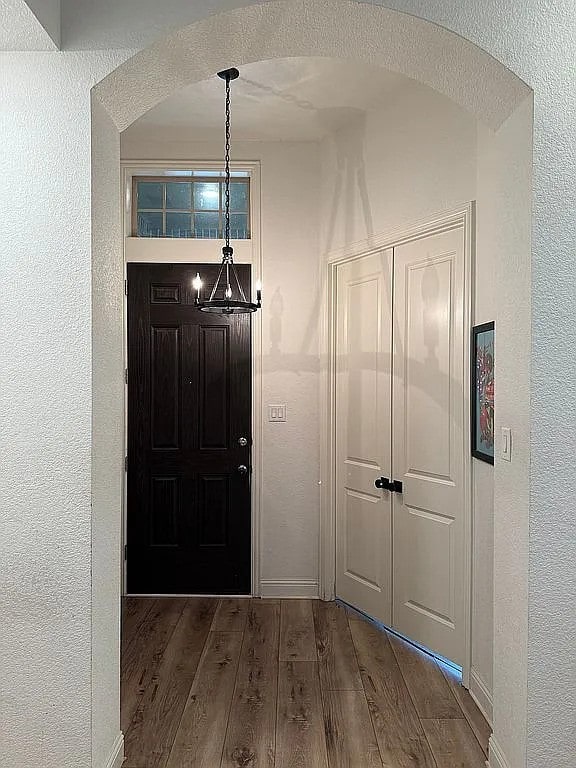 entrance foyer featuring dark hardwood / wood-style floors