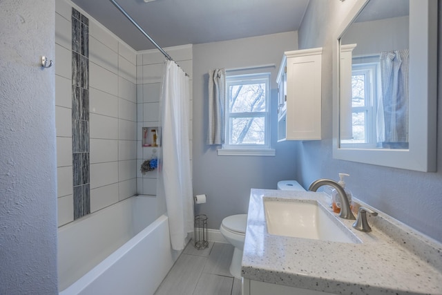 full bathroom with vanity, shower / tub combo with curtain, tile patterned floors, and toilet