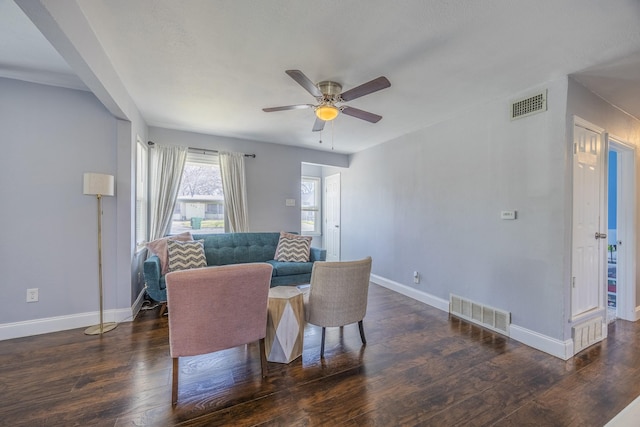 dining area featuring dark hardwood / wood-style flooring and ceiling fan