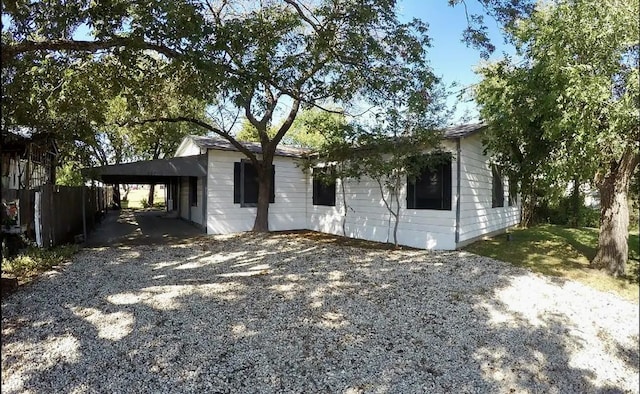 view of front of property with a carport