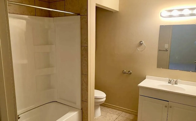 full bathroom with vanity, toilet,  shower combination, and tile patterned flooring