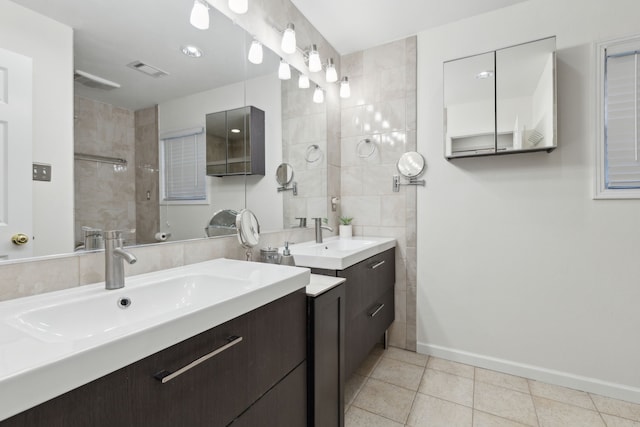 bathroom featuring vanity and tile patterned flooring