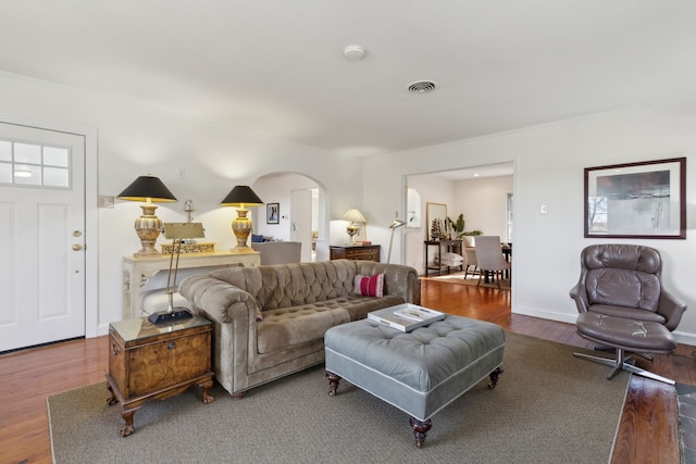 living room with dark hardwood / wood-style floors