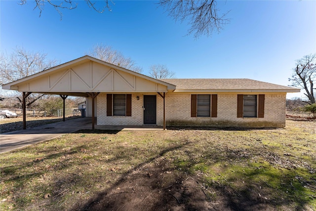 single story home with a carport