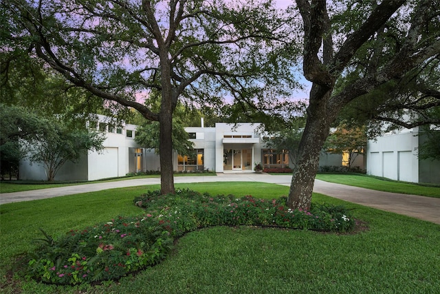 modern home with a lawn