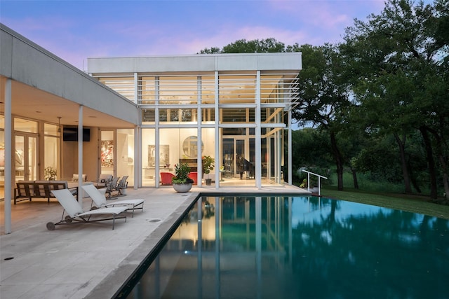 rear view of property with a patio area