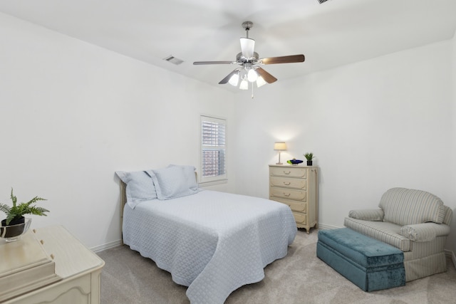 bedroom with light colored carpet and ceiling fan