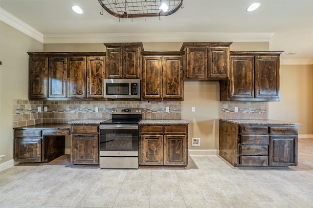 kitchen with crown molding, appliances with stainless steel finishes, dark brown cabinets, and decorative backsplash