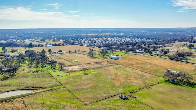 bird's eye view featuring a rural view and a water view