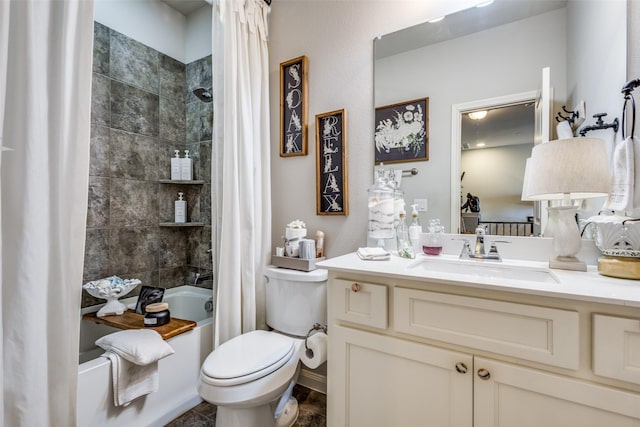 full bathroom featuring vanity, shower / bath combination with curtain, and toilet