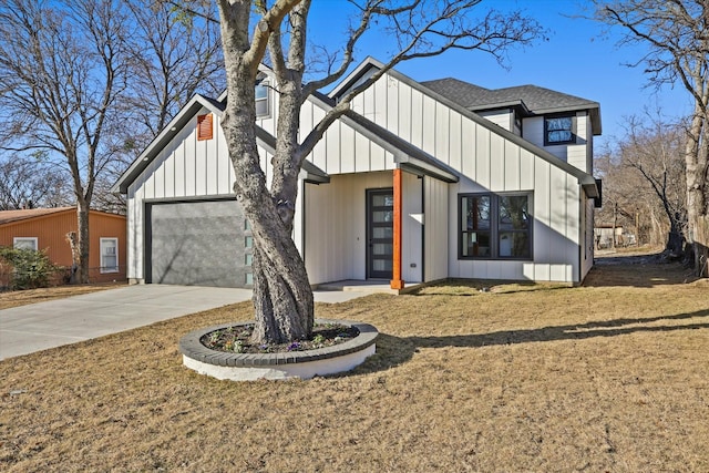 modern farmhouse with a garage and a front lawn