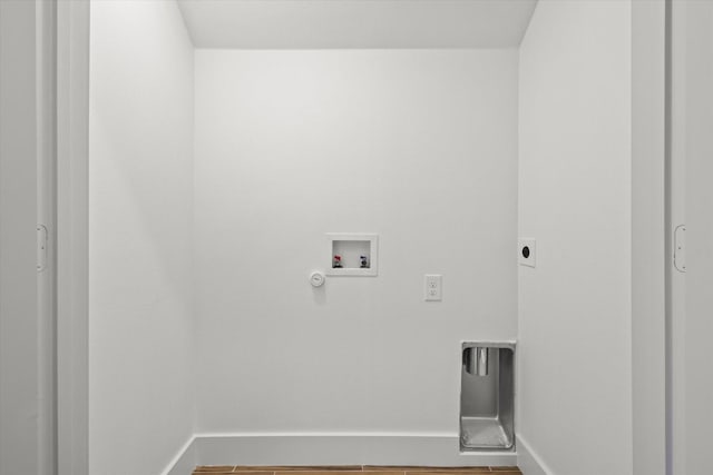 washroom with hardwood / wood-style floors, electric dryer hookup, and washer hookup