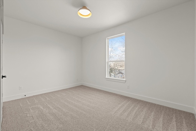 spare room featuring carpet flooring