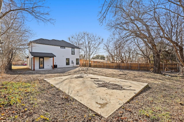 view of yard featuring central AC and a patio area