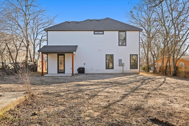 back of house with a patio and central air condition unit