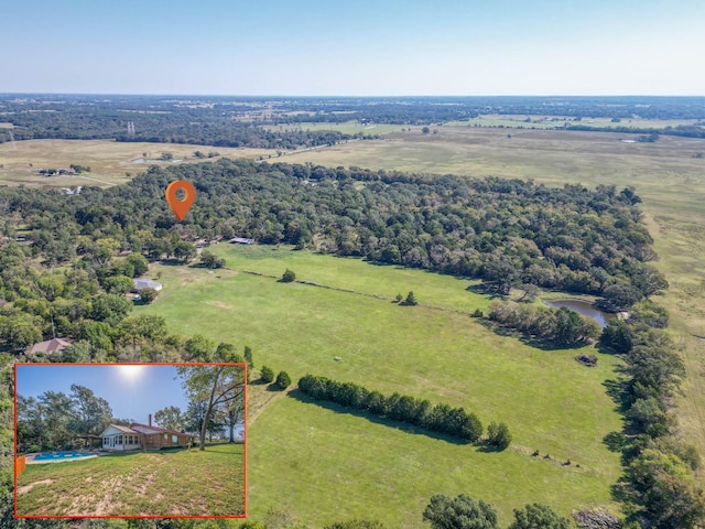 bird's eye view with a rural view and a water view